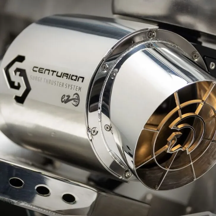 Close-up of a metallic Centurion Nv Series surge thruster system with a logo and protective grill, highlighting its polished, reflective surface and industrial design features personal to this advanced line.