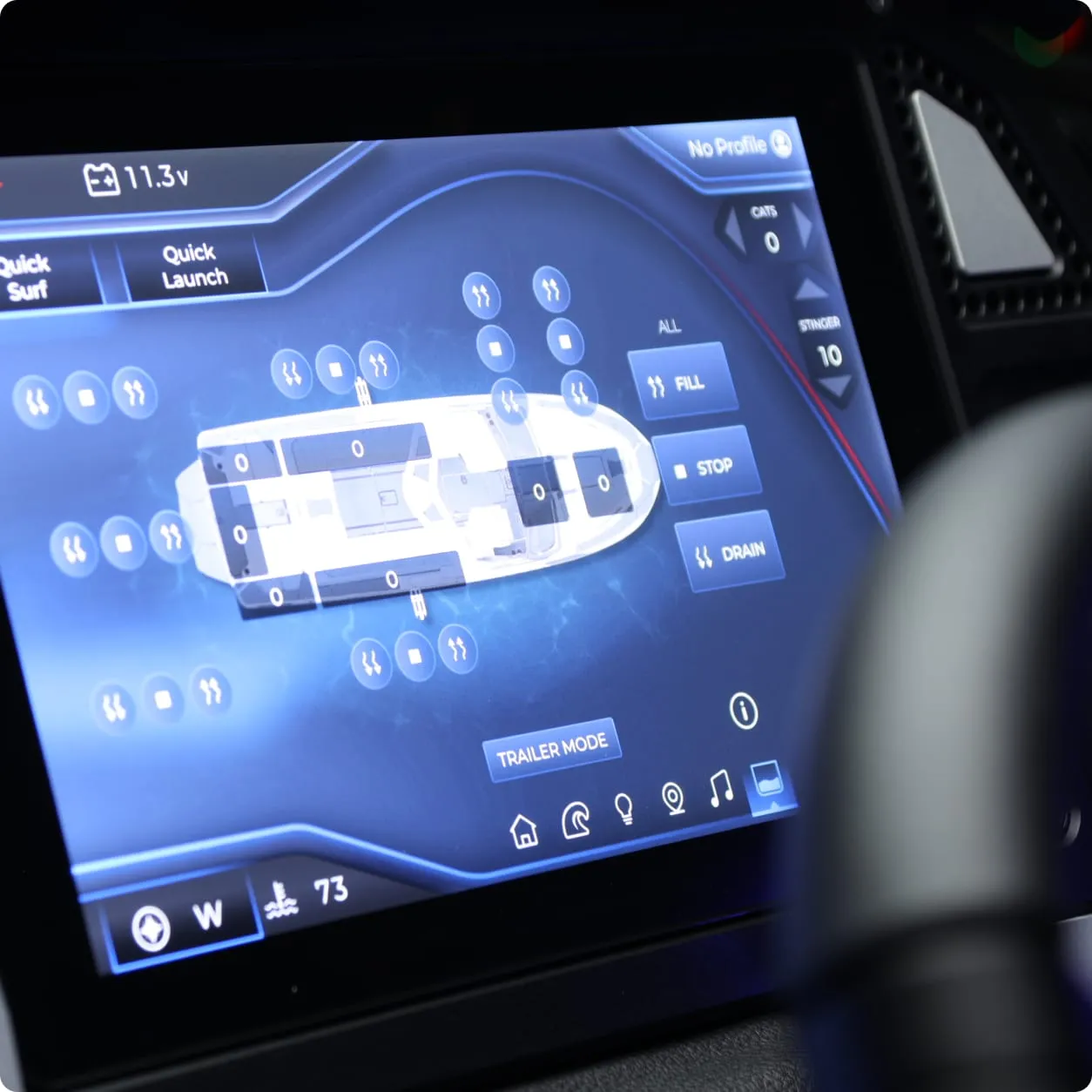 Close-up of a touchscreen control panel displaying various Centurion Ballast settings, including fill, stop, and drain options, along with a diagram of a boat.