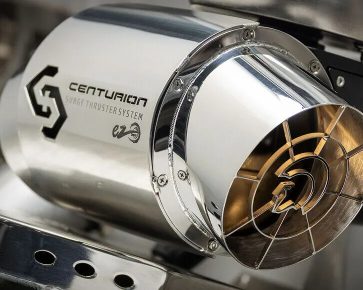 Close-up of a shiny, metallic machine labeled 