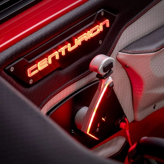 Close-up of a car interior featuring a glowing 