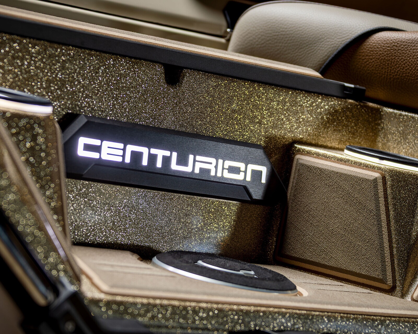 Close-up of a car interior detail featuring illuminated 