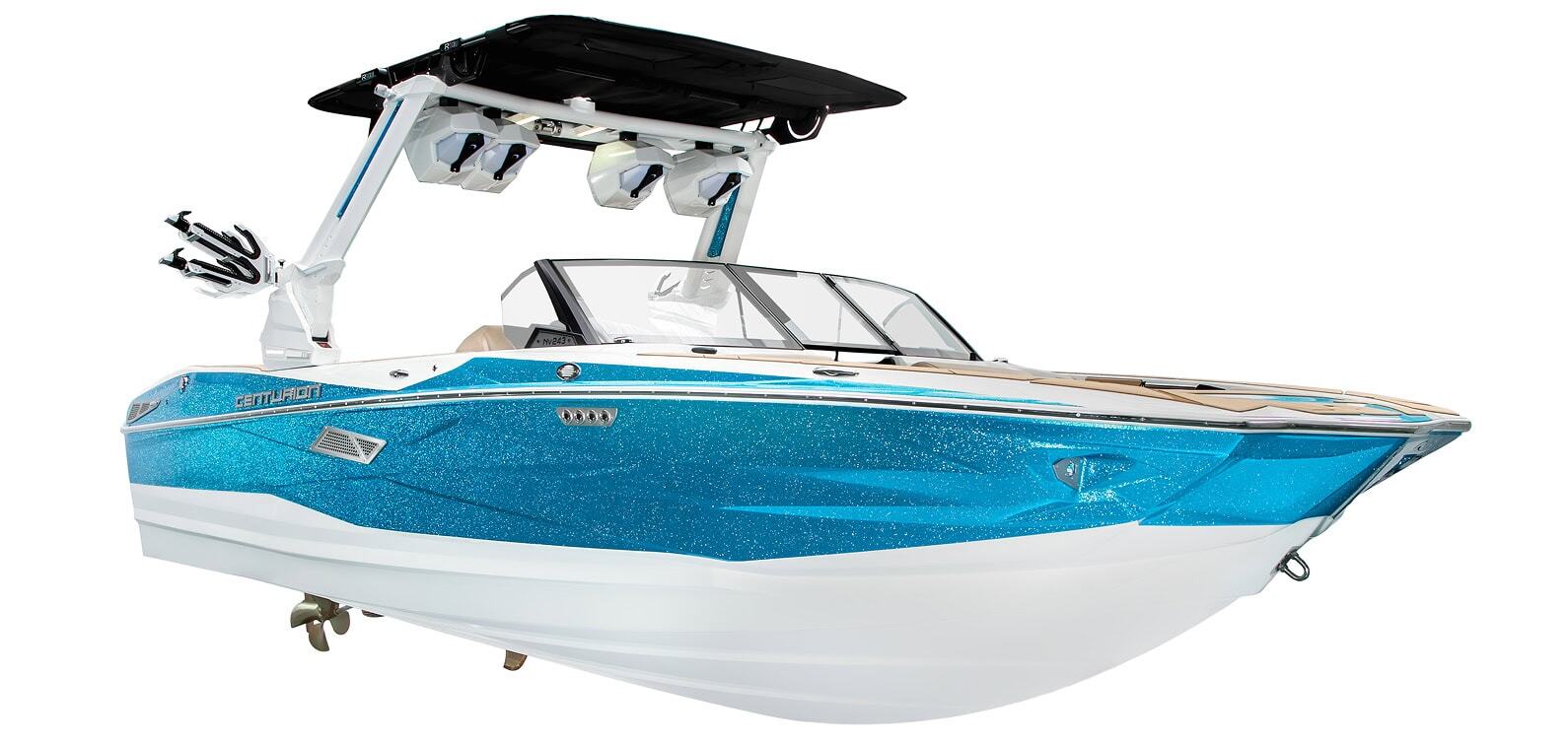 A blue and white Nv243 Wake Boat with a black roof, speakers, and wakeboard racks is shown isolated on a white background.