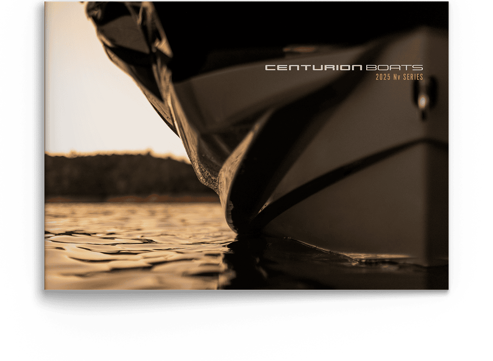 Close-up view of the front of a boat on water at sunset, with 