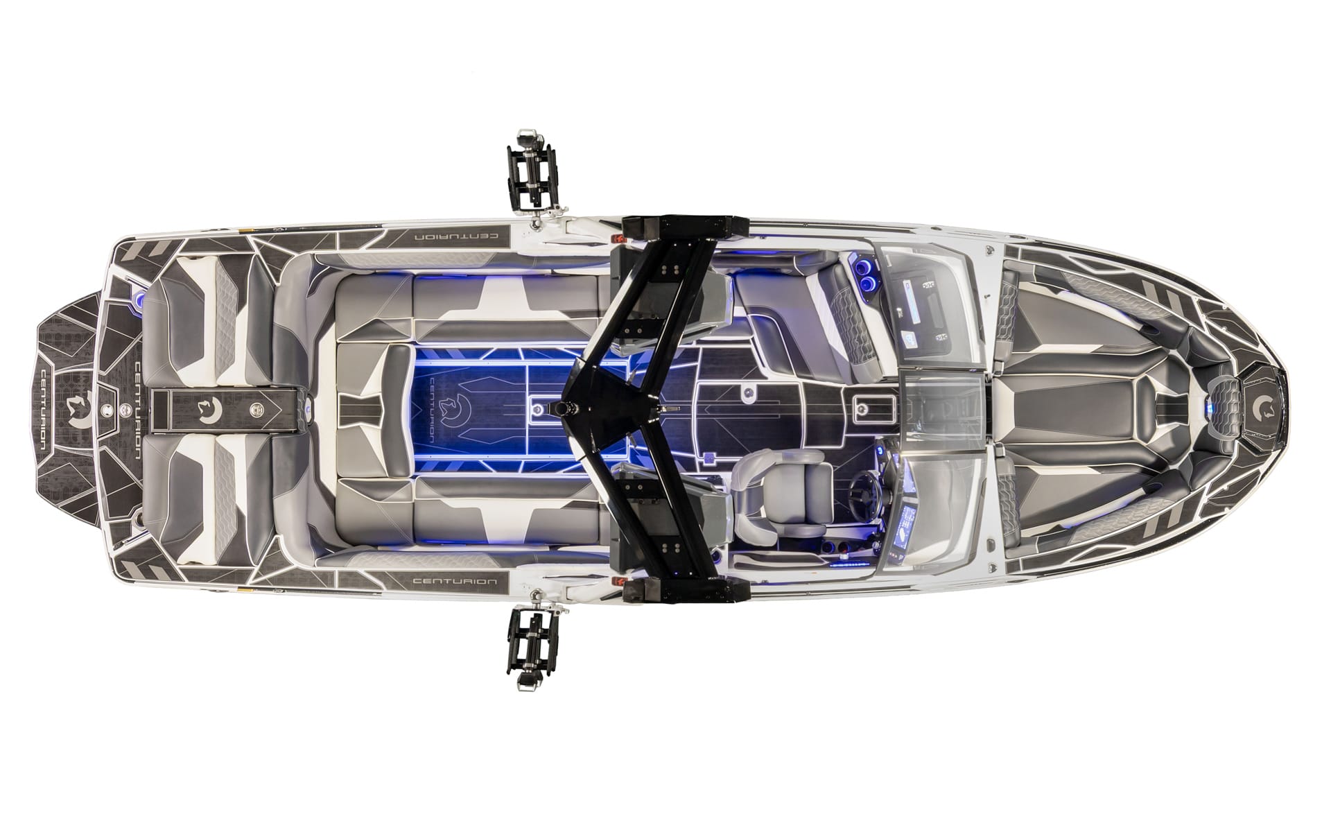 Top-down view of a Centurion Ri265 Surf Boat with gray and black seating, central walkways, illuminated interior accents, and mounted wakeboard racks.