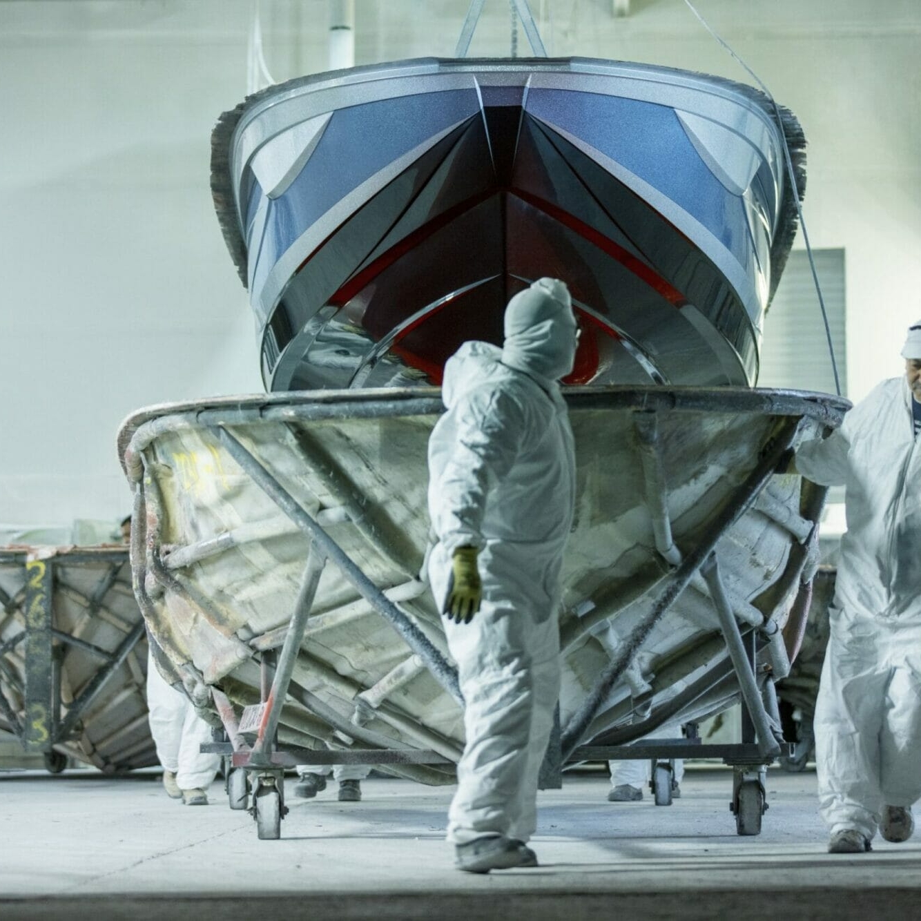 Factory worker gel coating hull