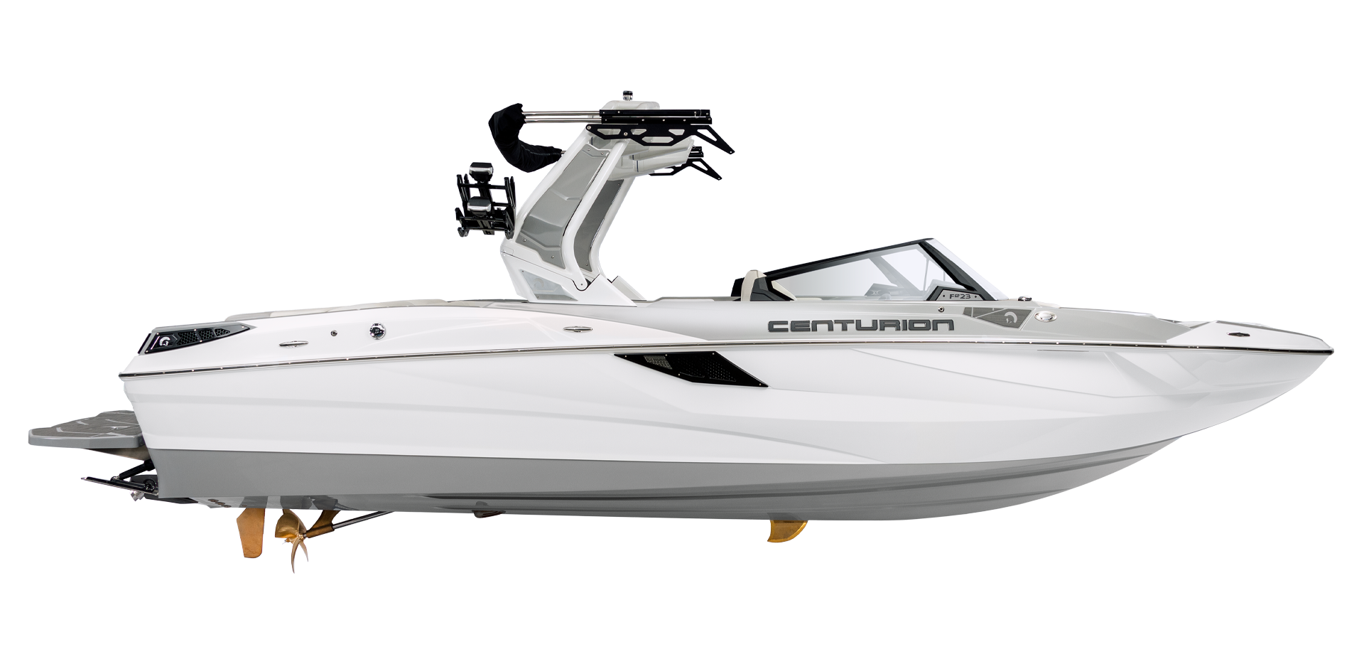 Side view of a white Centurion motorboat with a sleek design and modern features, including a wakeboard tower. The boat is elevated on stands.