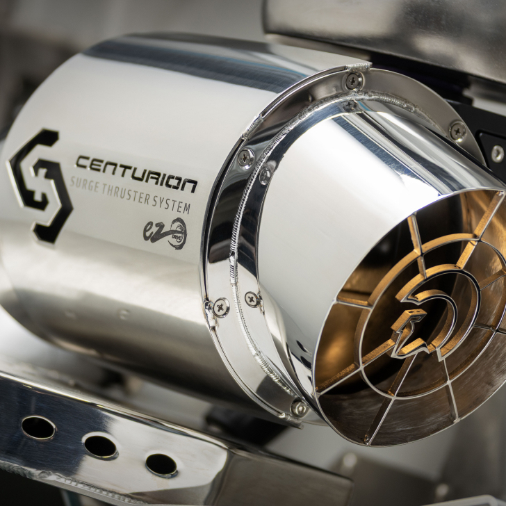 Close-up of a metallic Centurion Nv Series surge thruster system with a logo and protective grill, highlighting its polished, reflective surface and industrial design features personal to this advanced line.
