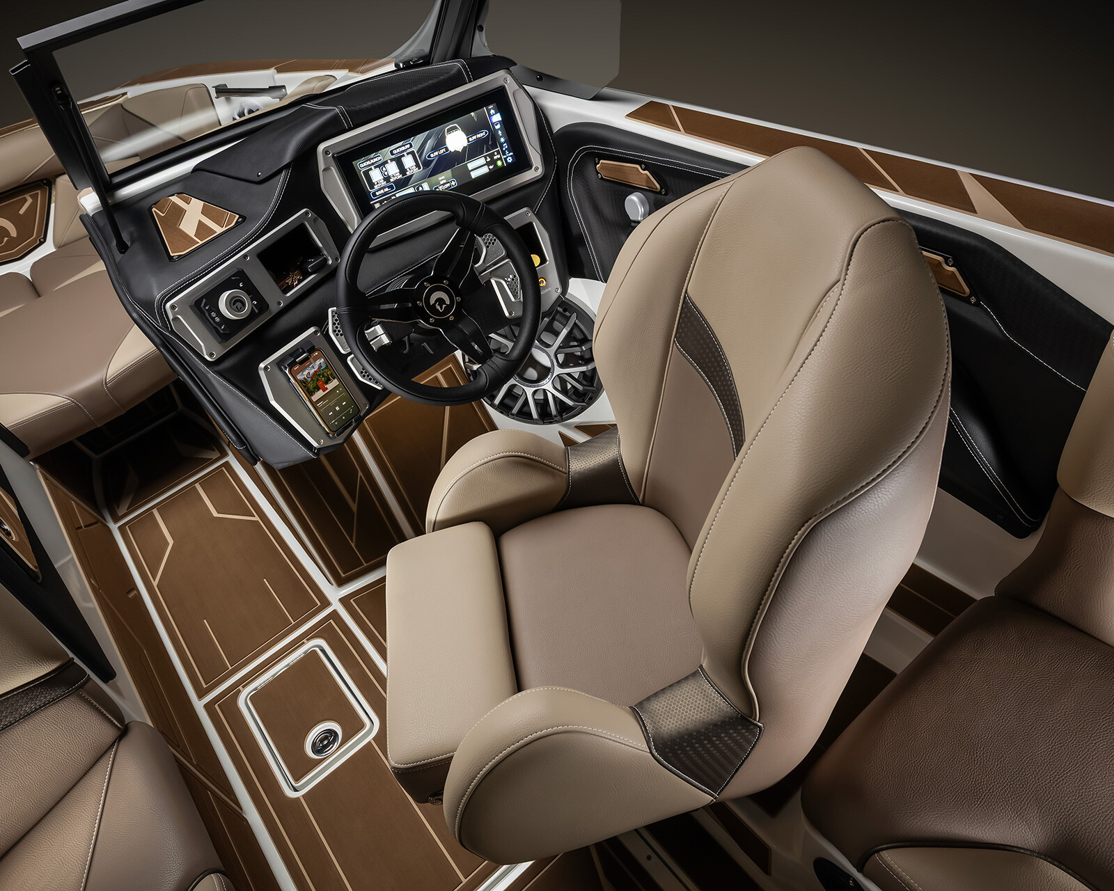 Luxury Centurion Nv213 cockpit featuring a tan captain’s chair, steering wheel, touchscreen display, and brown flooring with white accents.