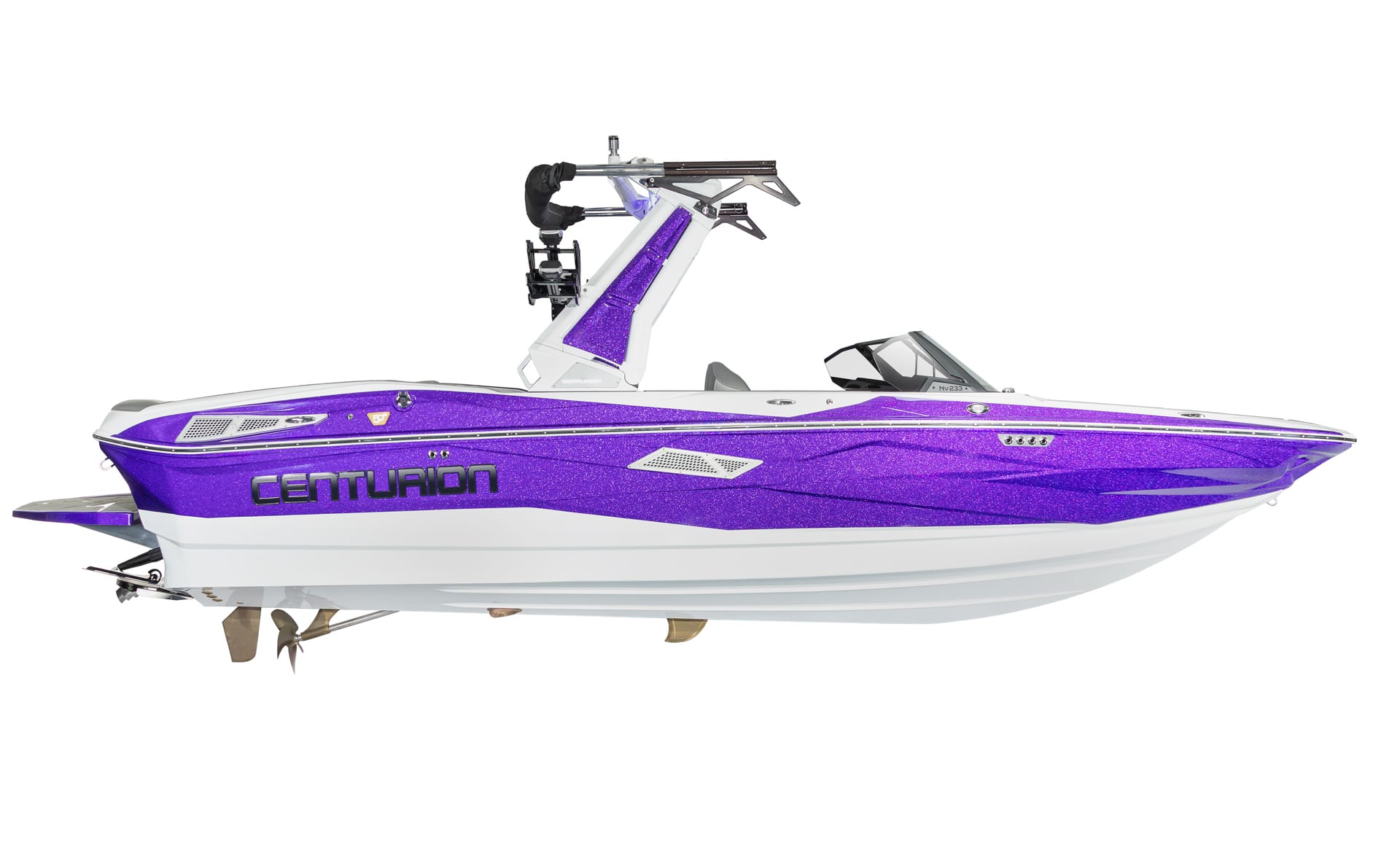A purple and white Centurion Nv233 surf boat.