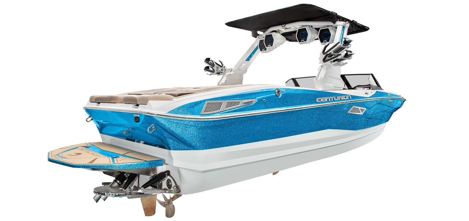 A blue and white Centurion Nv243 speedboat with seating, speakers, and a wakeboard tower, viewed from the rear left side against a white background.