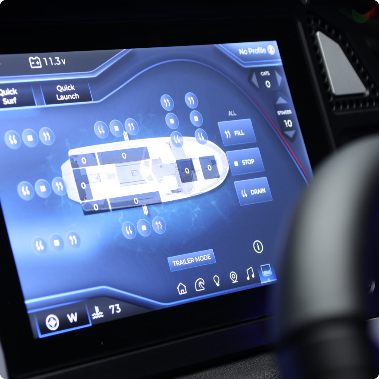 Close-up of a touchscreen control panel displaying various Centurion Ballast settings, including fill, stop, and drain options, along with a diagram of a boat.