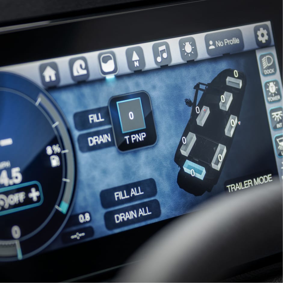 A close-up of a touchscreen boat control panel displaying options to fill or drain ballast tanks, featuring a digital diagram of the boat with RamFill technology.