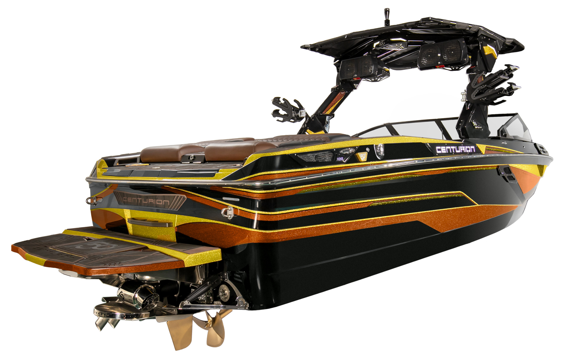 A black and orange Centurion Ri230 Surf Boat with brown seating, a wakeboard tower, and dual propellers, viewed from the rear and side on a white background.