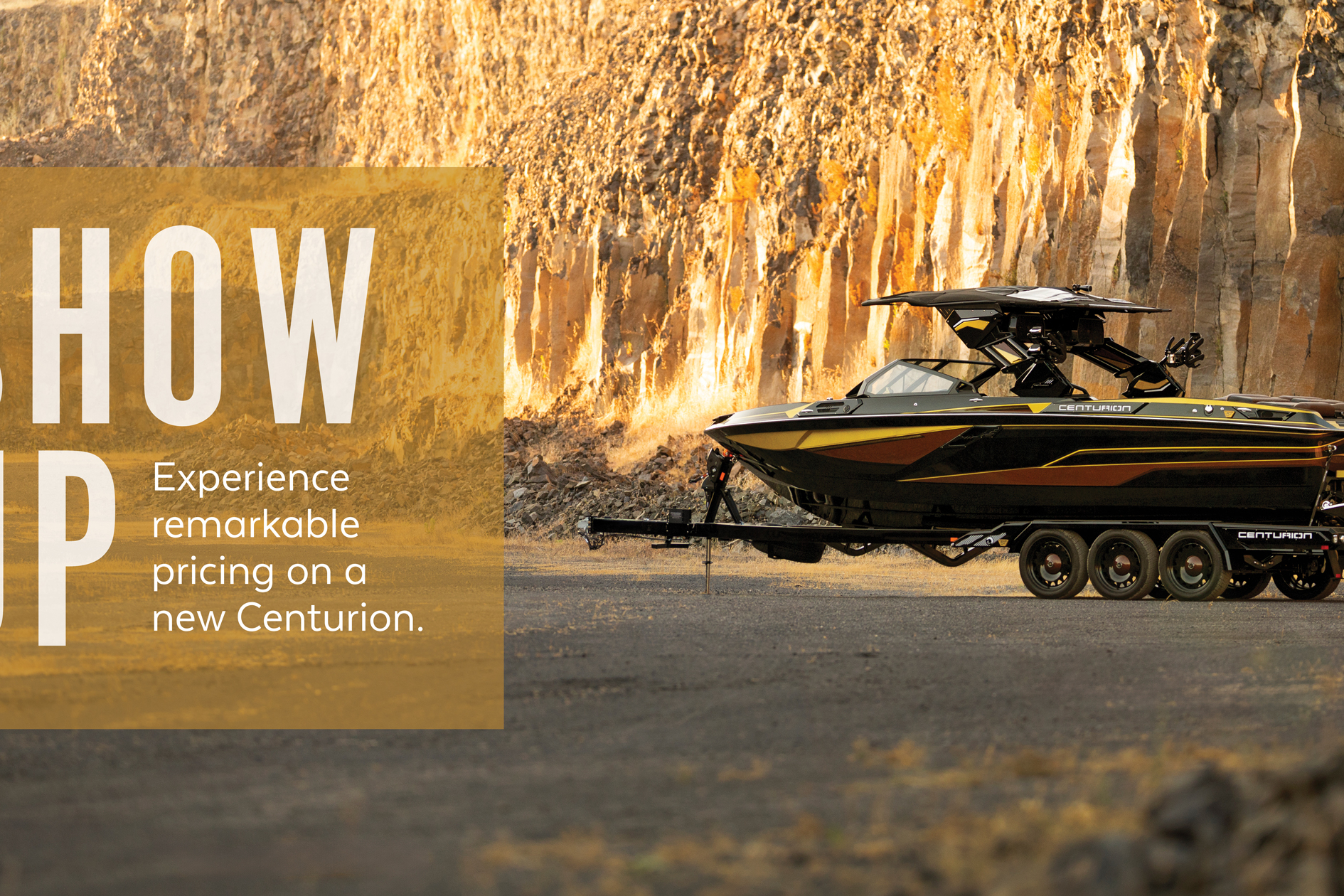 A black and yellow Centurion boat on a trailer is parked in front of a rocky cliff; promotional text appears on the left.